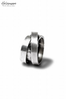 Holzpuppe Triple banded silver ring with unique texture