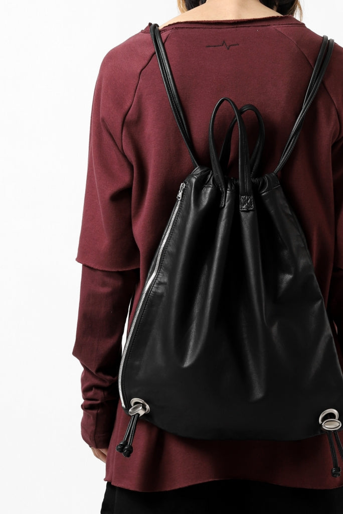 ISAMU KATAYAMA BACKLASH DRAWSTRING BACKPACK / MONOCHROME LUXURY STEER