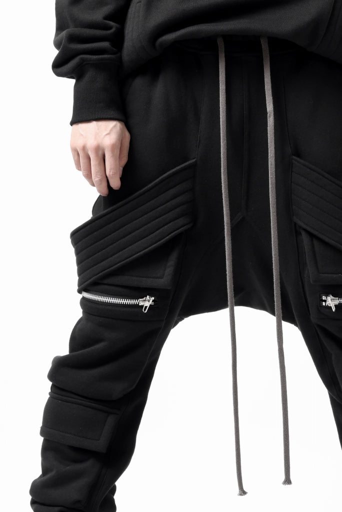 A.F ARTEFACT BELTED FLAP ZIP SARROUEL CARGO PANTS