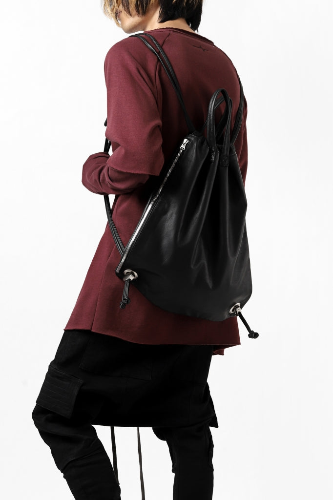 ISAMU KATAYAMA BACKLASH DRAWSTRING BACKPACK / MONOCHROME LUXURY STEER