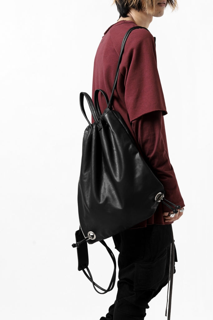 ISAMU KATAYAMA BACKLASH DRAWSTRING BACKPACK / MONOCHROME LUXURY STEER