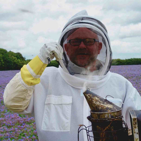 Steve in a beekeeping suit