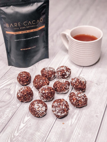 bare cacao bliss balls. peanut butter cacao coconut peanut butter ground almonds