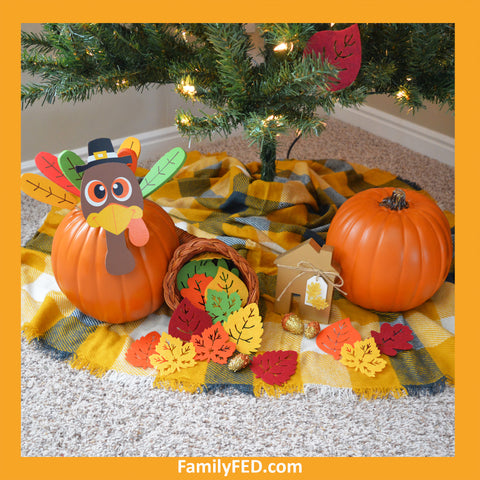 Place turkeys and leaves under a Thanksgiving tree to honor Thanksgiving with a turkey tree while enjoying the Christmas joy, light, and glow.