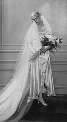 Woman wearing a typical wedding dress made of rayon in the 1930s