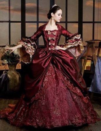 Woman wearing a burgundy wedding dress from the Renaissance period