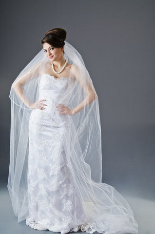 Bride wearing a chapel length veil