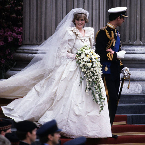 Princess Diana on her wedding day with Prince Charles in 1930; featuring her massive bridal bouquet