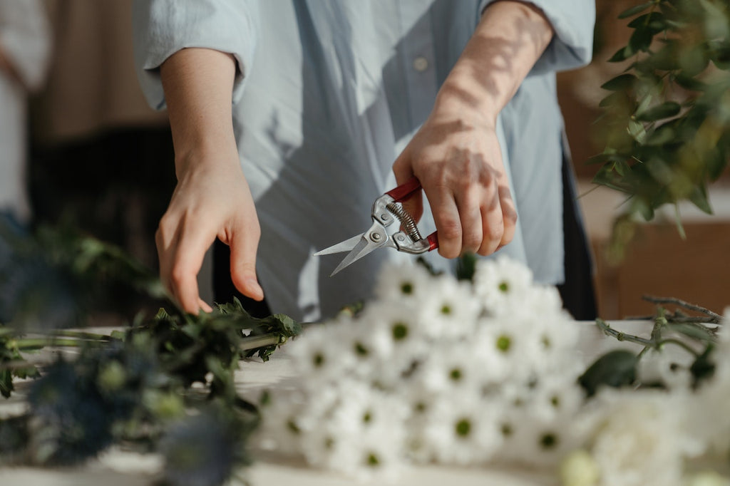 arranging flower bouquet