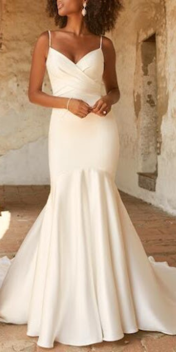 Elegant white wedding dress best paired with BOOMBA bra inserts