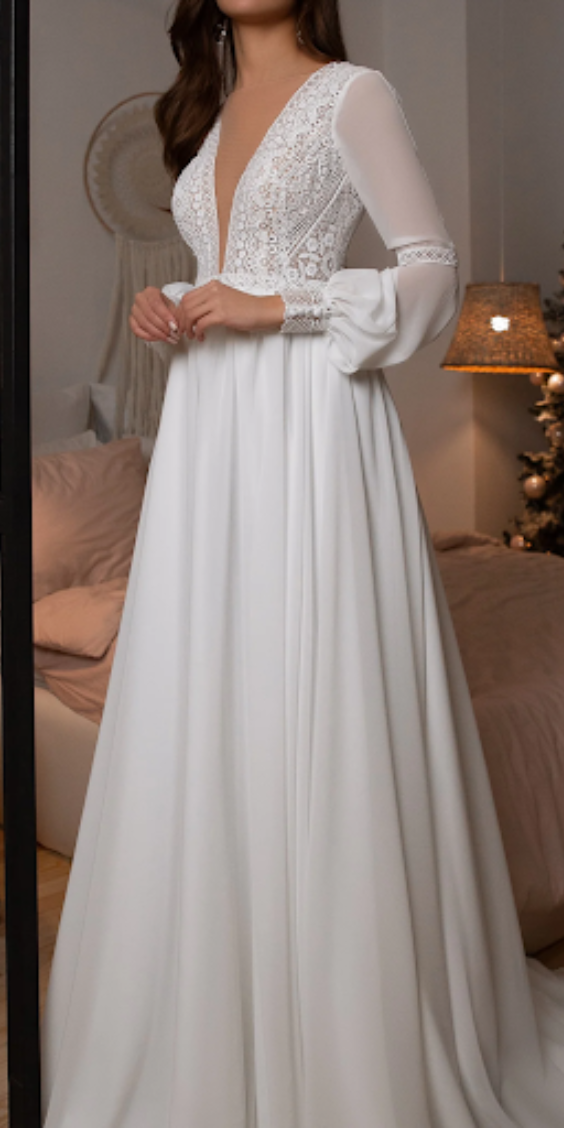 White plunging wedding dress with long-sleeves 
