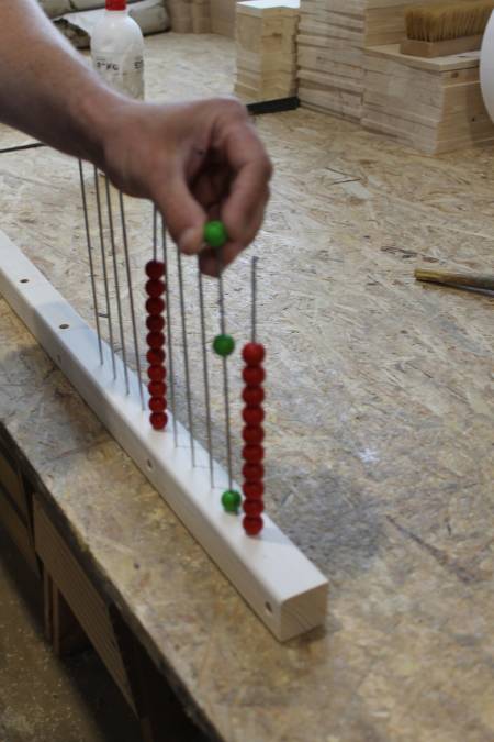 Manual assembly of abacus