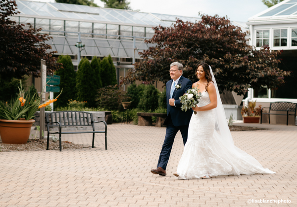 Bride and her dad walking down the aisle