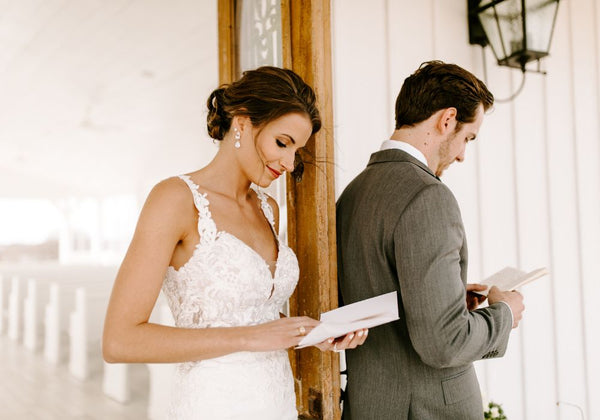 Bride and Groom Reading Letters