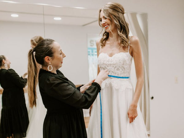 Taking Measurements Wedding Dress