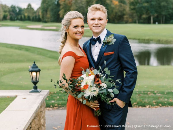 Bridesmaid and Groomsman Posing Together