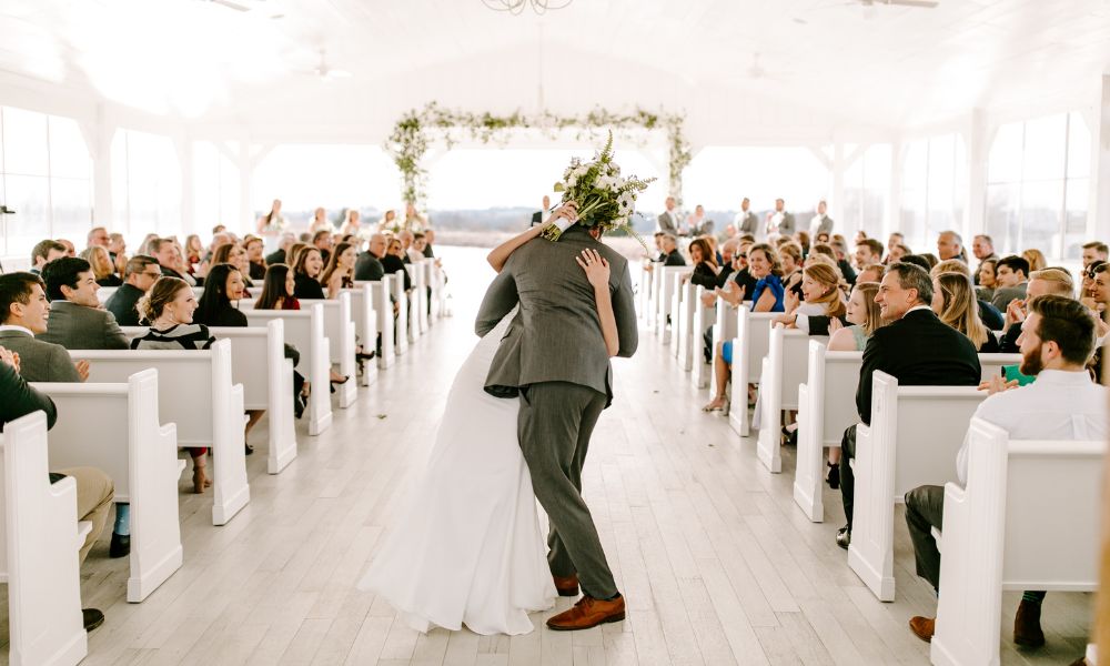 Wedding Photo - Kissing in the Aisle