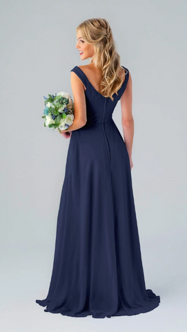 Kennedy Blue model wearing an elegant dress with a sweetheart neckline and off the shoulder straps.