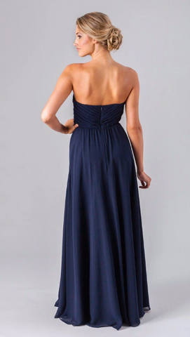 Kennedy Blue model wearing a romantic dress with a strapless sweetheart neckline, fitted bodice, and a flowy skirt.