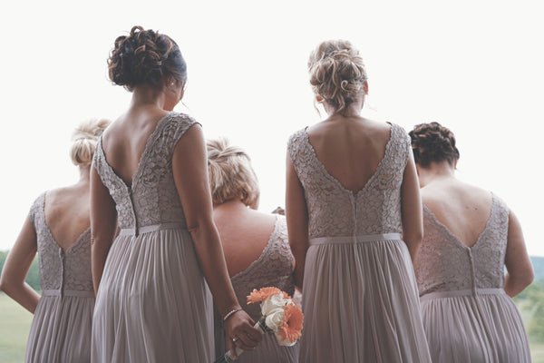 bridesmaids standing together | How to Plan Your Wedding Party for Your Gay Wedding