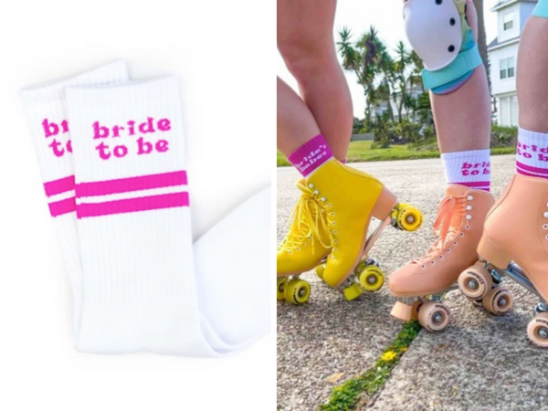 Retro bride-to-be white tube socks in bright pink font and pink stripes. 