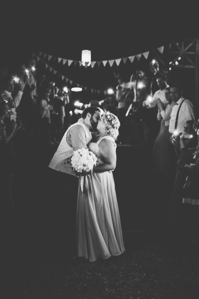 An adorable send off pic of the bride and groom | A Charming Tennessee Wedding | Kennedy Blue