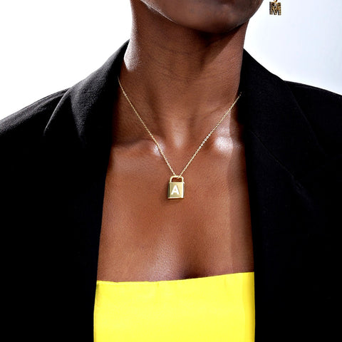 Woman Modeling Gold Lock Necklace With Diamond Initial Letter - OurCoordinates