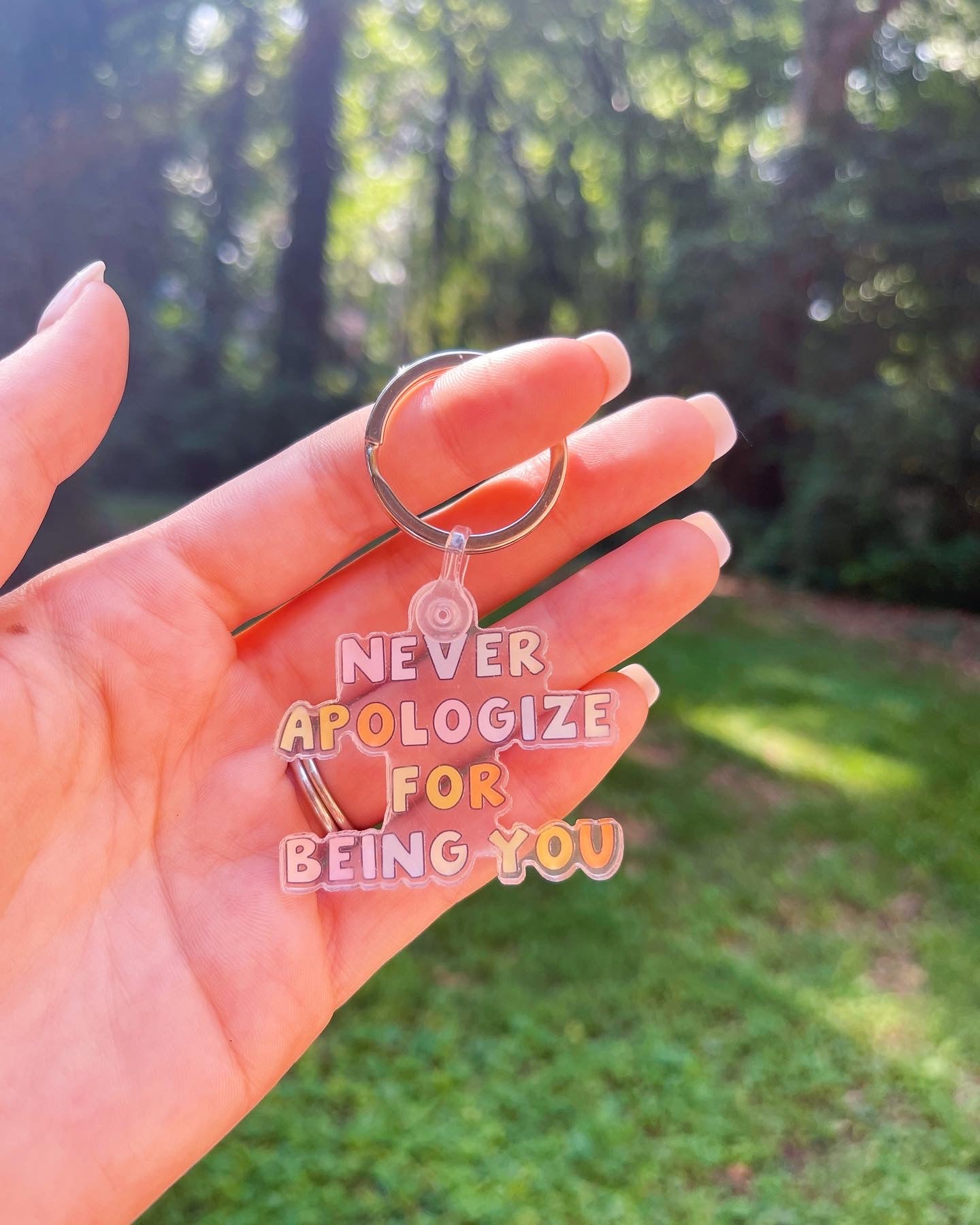 NEVER APOLOGIZE FOR BEING YOU KEYCHAIN