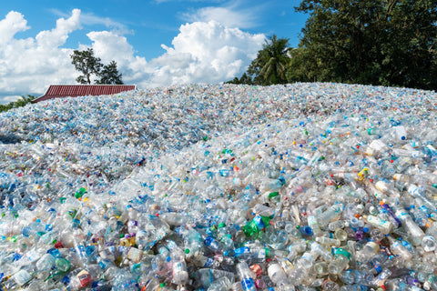 hill covered in plastic trash