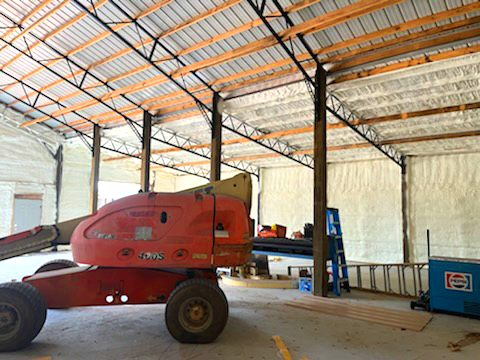 SQUARE TUBE STEEL TRUSSES WITH SPRAY FOAM INSULATION