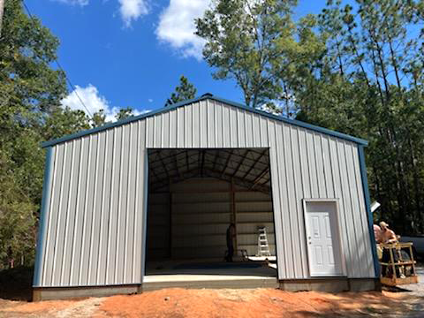 POLE BARN WITH GABLE STEEL SQUARE TUBE TRUSSES
