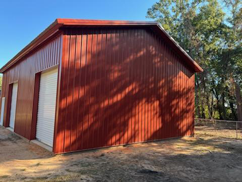 BLACKWATER TRUSS POLE BARN WITH ROLL UP DOORS