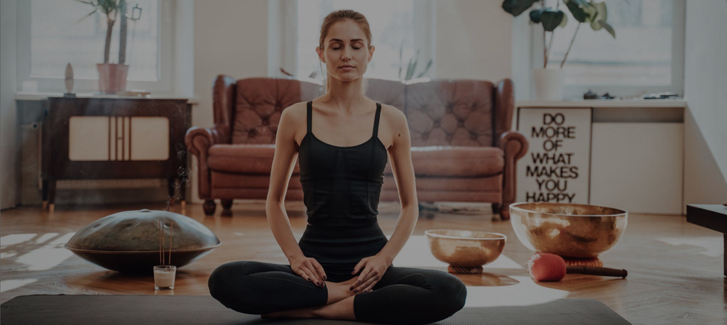 A lady doing yoga.