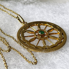 Load image into Gallery viewer, Antique Edwardian Demantoid Garnet Pinwheel Pendant Necklace. Art Nouveau 12ct Yellow Rolled Gold &amp; Green Garnet Circle Pendant On Chain.
