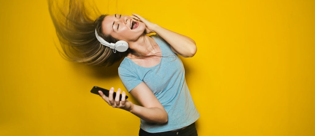 Energetic person listening to music.