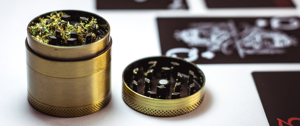 A weed grinder with a kief catcher at the bottom.