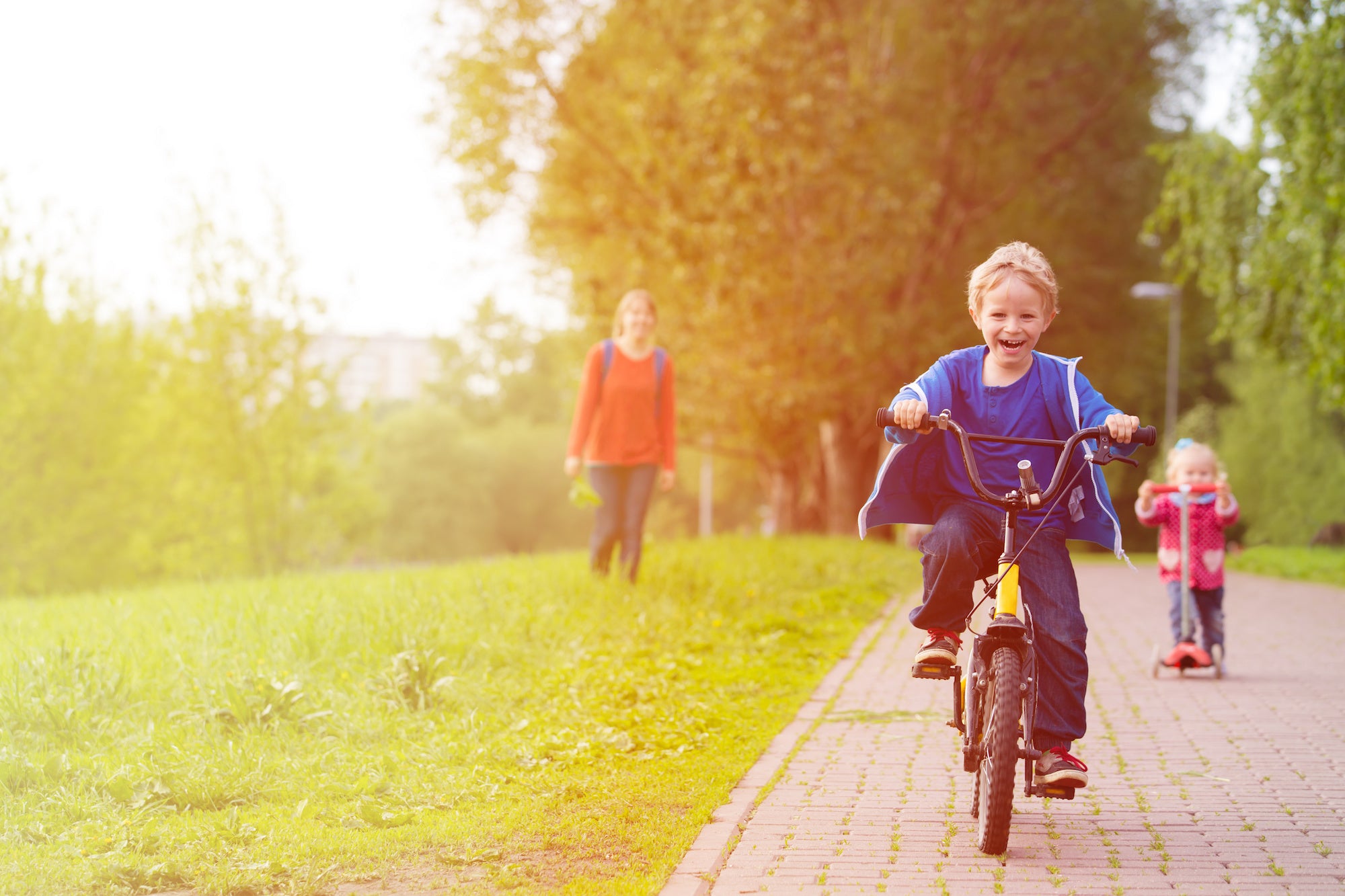 child learning to ride a bike