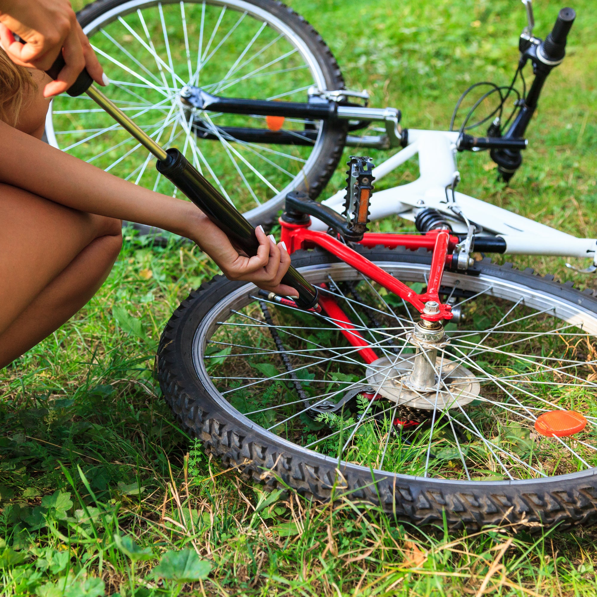 pumping bike tyres at petrol station