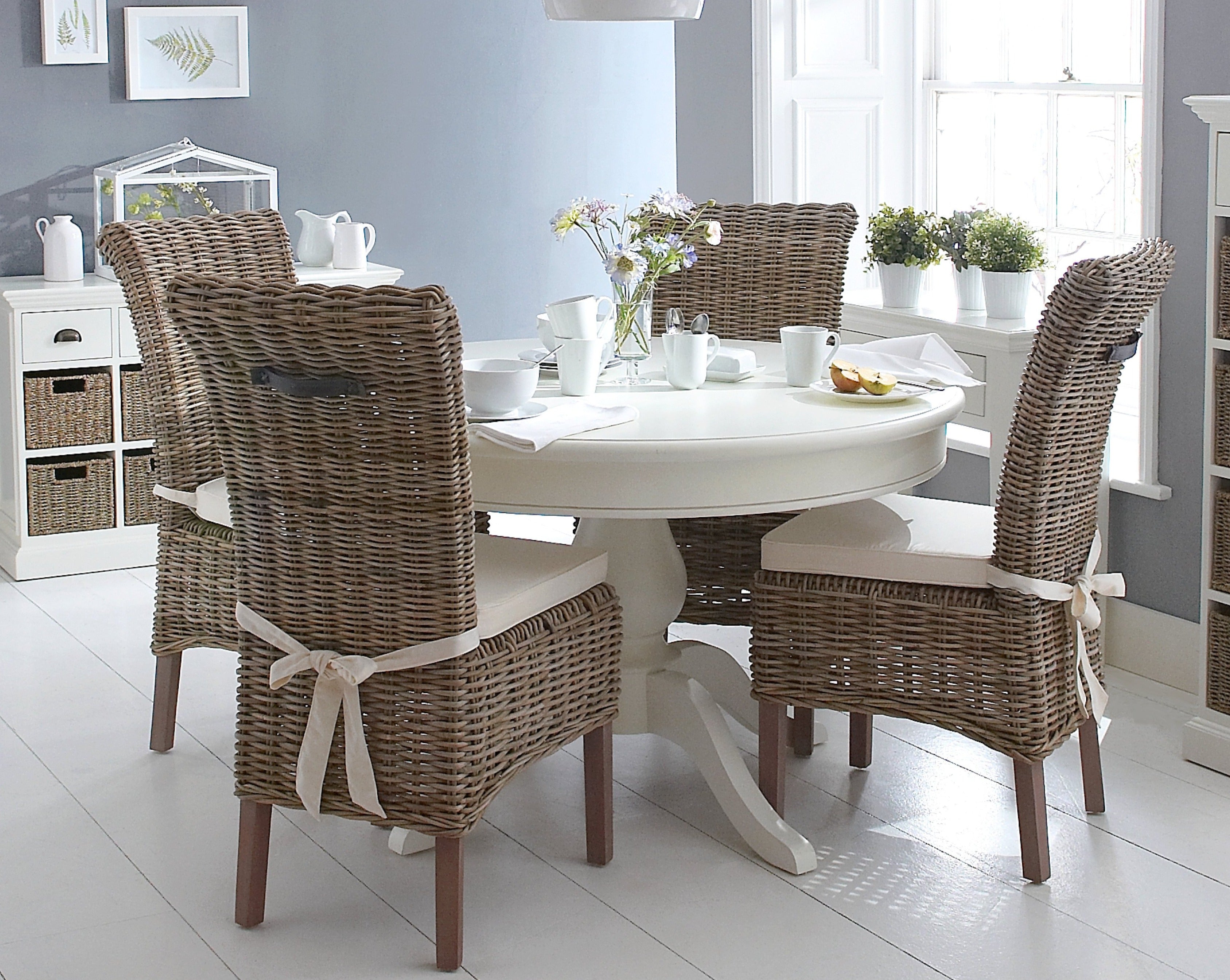 oak table and wicker chairs