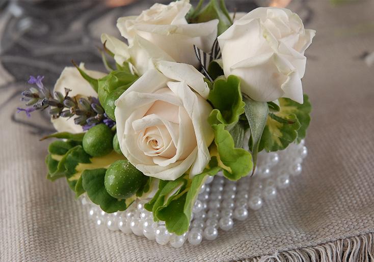 making a wrist corsage with real flowers