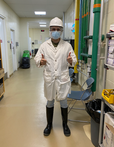 Cofounder Devon Hawkins dressed in full PPE before entering the food production facility in Leduc Alberta Canada