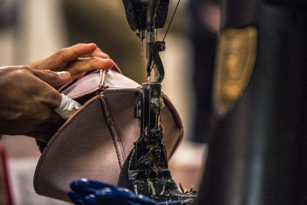 Football panels being sewn together at Big Game USA