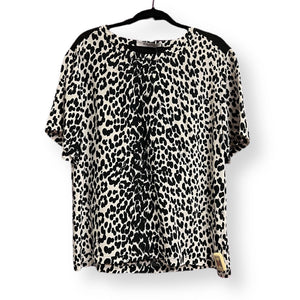 Pre-Owned GIVENCHY Black and White Oval Print Top | Size L – theREMODA