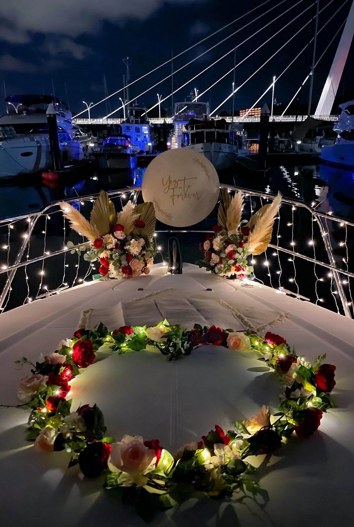 Romantic Yacht Proposal Decor in Singapore with Fairylight Backdrop, Pastel Balloons and Flowers by Style It Simply