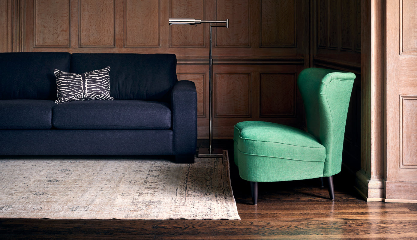 Blue velvet Afton Sofa, Oakland Cocktail Table, turquoise ceramic jar