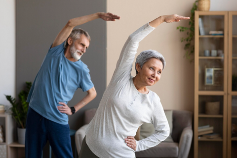 Elderly couple exercising together