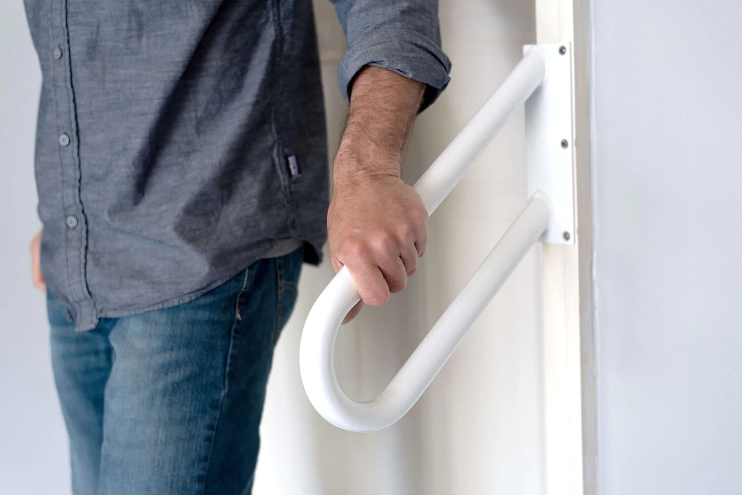 Man using Jamb Mount Handrail