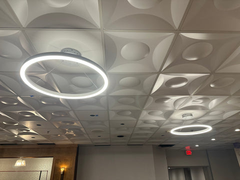 Globen ceiling tile with lighting