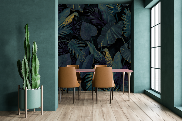 Green wall dining area of modern home featuring a tropical leaves wallpaper on dark background