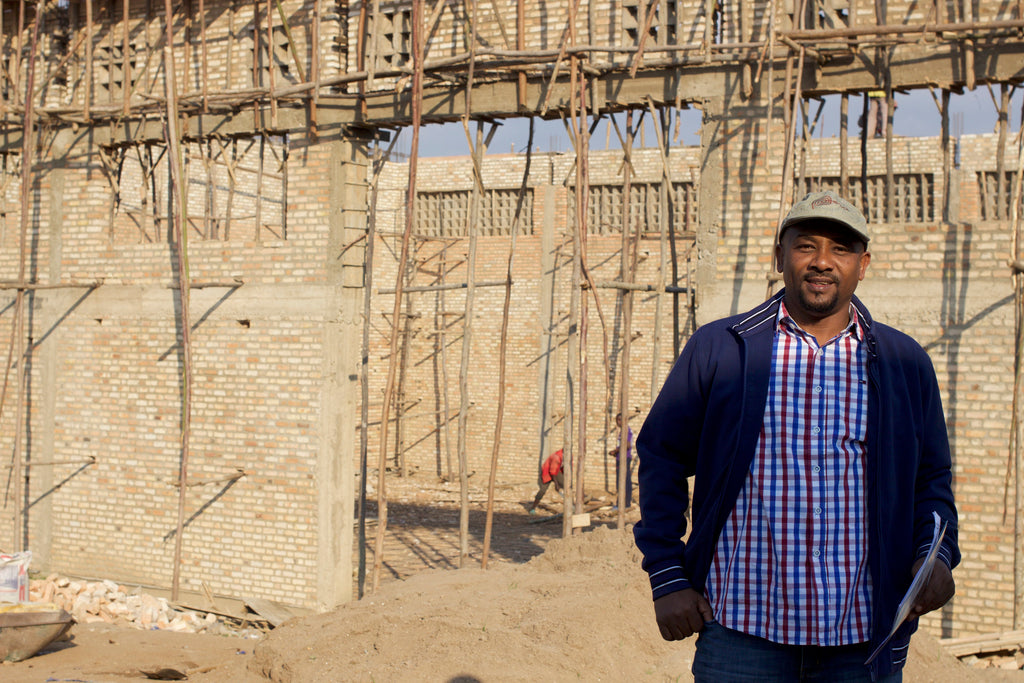 Salum on the construction site of his new dry mill. Production was up double this year on last, so he hopes to have this place up and running for the 2018 harvest.